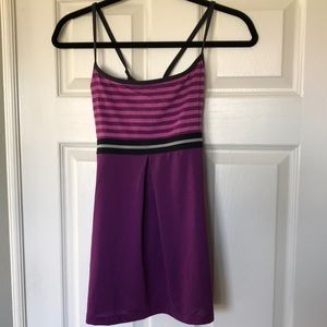 Lucy brand activewear top with crisscross back and built in bra shelf.